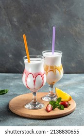 Glasses With Vanilla Milk Shakes, Milk Cocktail, Vanilla Ice Cream Milk Shake. Banana Smoothie With Mint And Vanilla,