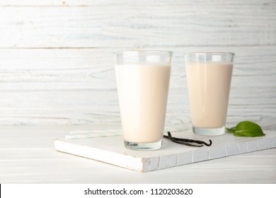 Glasses With Vanilla Milk Shakes On Table