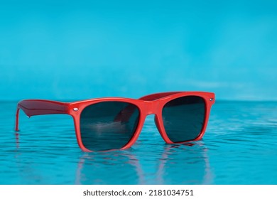 Glasses In The Water, Blue Tropical Beach. Copy Space, No People