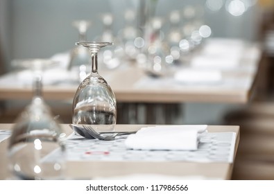 Glasses Of Water Lined Up On Luxury Table Setting For Dining, Selective Focus With Bokeh Background