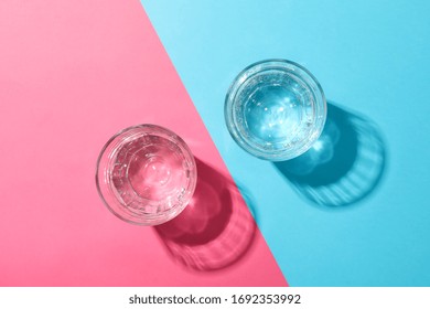 Glasses With Water On Two Tone Background, Top View