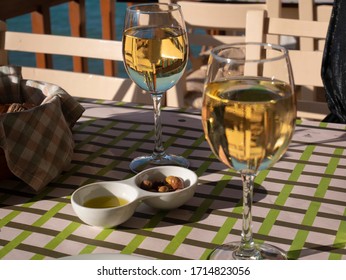 Glasses Of White Wine In Crete, Greece