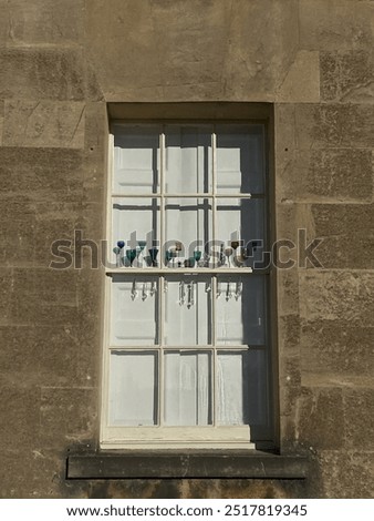 Glasses in window installation, colourful