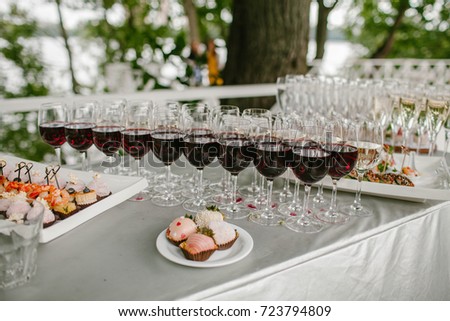 Glasses of wine on the table seating. Food