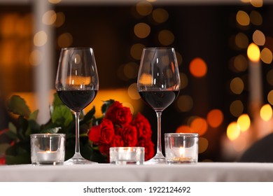 Glasses Of Wine For Romantic Dinner On Table In Restaurant