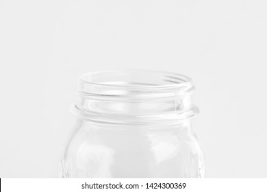 Glassware Crystal Mason Jar On White Wall Background. Reusable Materials Plastic-free Alternatives Zero Waste Environmental Protection Food Storage Concept. Mockup Poster With Copy Space