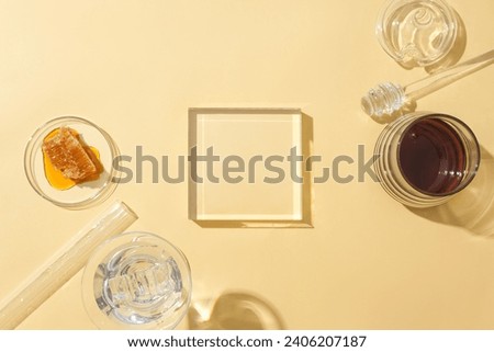 Glassware is displayed on a beige background with honey. Honey stimulates the skin to produce collagen, creating smoothness for the skin and neutralizing free radicals.