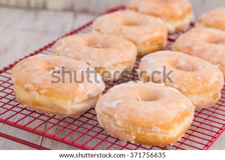 Similar – Image, Stock Photo round red glazed donut and paper cup with coffee