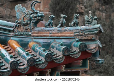 Glazed china jade roof tiles in a historic temple with a dragon