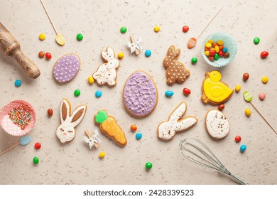 Glazed color gingerbread Easter figures - rabbit, chicken, egg, carrot   on bright background. Happy Easter. Top View - Powered by Shutterstock