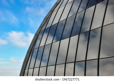 glazed dome in a cloudy sky