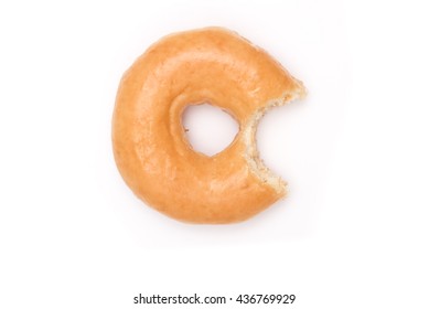 Glazed Donut with Bite on White background