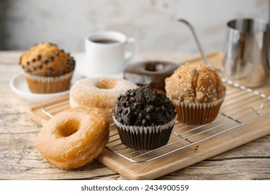 glazed donuts with coffee and muffins - Powered by Shutterstock