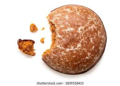 Glazed Gingerbread Lebkuchen With Chocolate Isolated On White. Bite Missing With Crumbs. Top View.