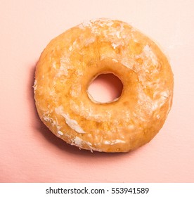 Glazed Plain Donut On Pink Background