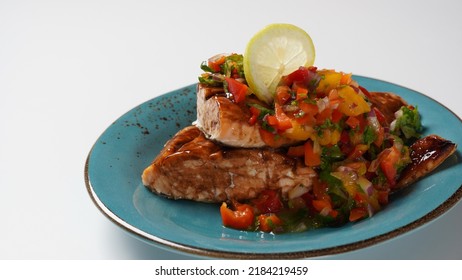 Glazed Salmon Fillet With Mango Salsa, Herbs And Lemon