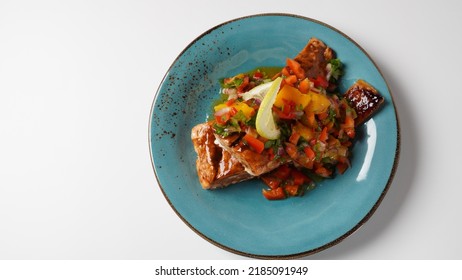 Glazed Salmon Fillet With Mango Salsa, Herbs And Lemon