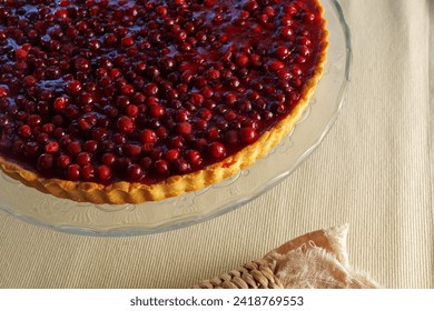 Gleaming Gastronomy: A Luscious Pie Gracefully Resting on a Delicate Glass Plate