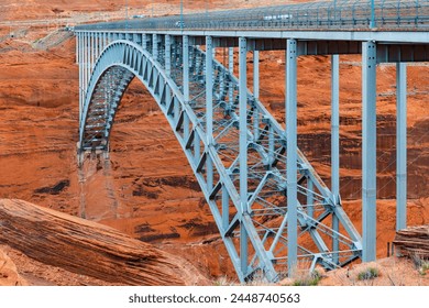 Glen Canyon Dam bridge, at the time of its completion (1959), the highest arch bridge worldwide and the second highest bridge of any type. Steel construction above Colorado river canyon in Page (AZ). - Powered by Shutterstock