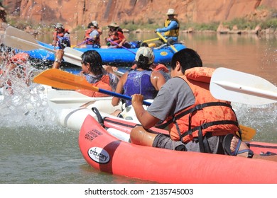 Glen Canyon National Recreation Area, Arizona, USA - Circa  June 2015 - Dine (Navajo) Youth Having Water Battle While Rafting On The Colorado River.