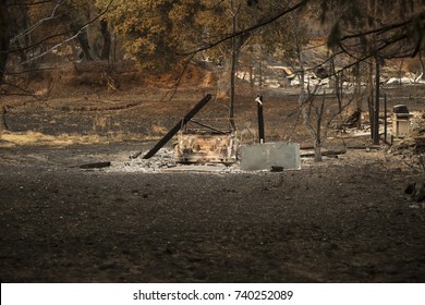 GLEN ELLEN, CALIFORNIA/ USA - OCT 16, 2017: A Burned Car Near The Remains Of A Home In A Sonoma County Neighborhood. Fires In California Have Burned Over 220,000 Acres And Destroyed 5700 Structures.