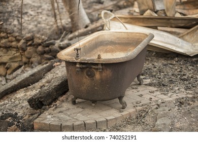 GLEN ELLEN, CALIFORNIA/ USA - OCT 16, 2017: A Bathtub Sits In The Burned Remains Of A Sonoma County Home. Fires In California Have Burned Over 220,000 Acres And Destroyed 5700 Structures.