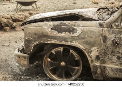 GLEN ELLEN, CALIFORNIA/ USA - OCT 16, 2017: A Burned Car Near The Remains Of A Home In A Sonoma County Neighborhood. Fires In California Have Burned Over 220,000 Acres And Destroyed 5700 Structures.