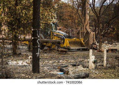 GLEN ELLEN, CALIFORNIA/ USA - OCT 16, 2017: A Bulldozer Clears A Path In A Destroyed Sonoma County Neighborhood. Fires In California Have Burned Over 220,000 Acres And Destroyed 5700 Structures.