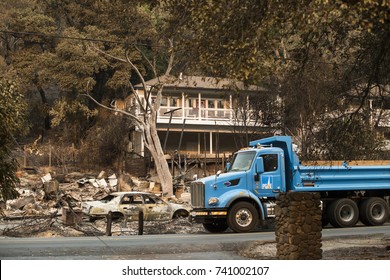 GLEN ELLEN, CALIFORNIA/ USA - OCT 16, 2017: A PG&E Truck Drives Through A Devastated Sonoma County Neighborhood. Fires In California Have Burned Over 220,000 Acres And Destroyed 5700 Structures.