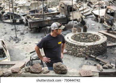 GLEN ELLEN, CALIFORNIA/ USA - OCT 16, 2017: A Man Stands In The Ruins Of His Burned Home In Glen Ellen. Fires In California Have Burned Over 220,000 Acres And Destroyed 5700 Structures.