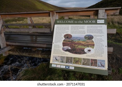 Glenlivet Estate, Scotland, UK, November 7 2021: Welcome to the Moor sign at Lecht, Scottish Highlands. Information about habitat, wildlife and land management. Moor, hills, stream, bridge background.