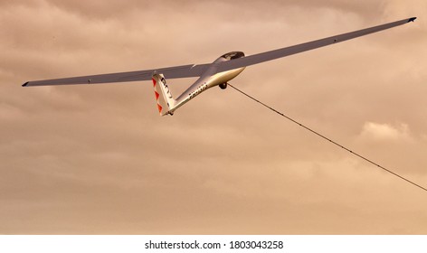 Glider Plane In The Clouds 