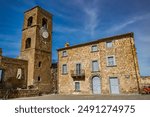 A glimpse of the ancient medieval village of Celleno, Viterbo, Italy. Ghost town, with houses in ruins, abandoned and uninhabited. Some of the buildings left standing in the center of the town.