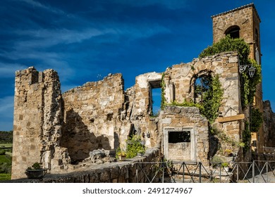 A glimpse of the ancient medieval village of Celleno, Viterbo, Italy. Ghost town, with houses in ruins, abandoned and uninhabited. The crumbling and collapsed walls of old ruined buildings. - Powered by Shutterstock