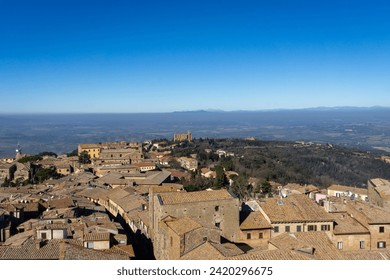 glimpse of the city of Volterra.  in the background the hills of the Cecina Valley