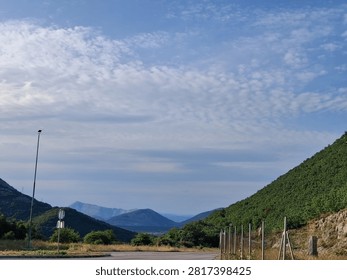 A glimpse of the mountains hidden behind clouds 