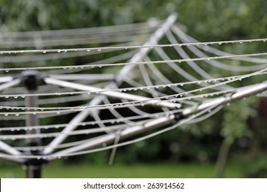 Glistening Water Drops On A Rotary Clothes Line