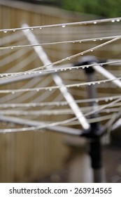 Glistening Water Drops On A Rotary Clothes Line