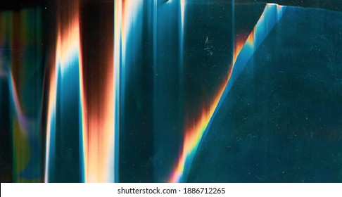 Glitch overlay. Damaged screen. Dust scratches texture. Colorful digital noise design on blue glass shattered display surface with rainbow orange red artifacts stains. - Shutterstock ID 1886712265