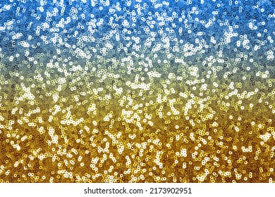 Glitter background blue, yellow, glitter background, shiny surfactant. Holiday abstract glitter background with flashing light - Shutterstock ID 2173902951