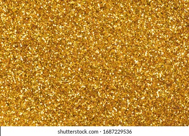 Glitter Background In New Stylish Tone, Your Texture In Gold Tone As Part Of Your Holiday Desktop. High Resolution Photo.