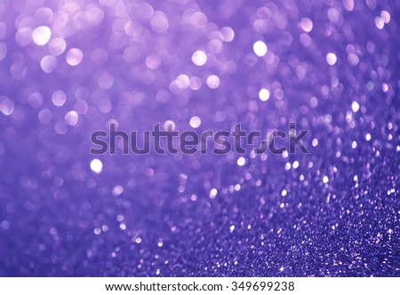 Glitter bokeh abstract violet ackground.