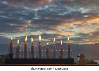 Glitter Light Of Menorah Candles Is A Traditional Symbol For Hanukkah Holiday. Selective Focus. Image Slightly Toned For Vintage Style 