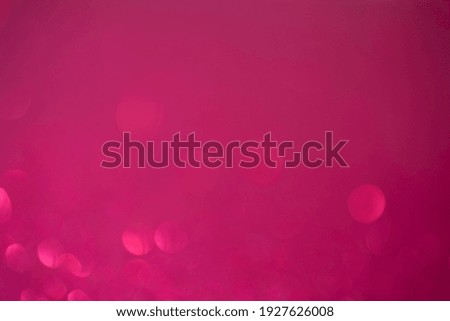 Glitter pink bokeh background.  Red and pink background with sparkling festive glitter.
