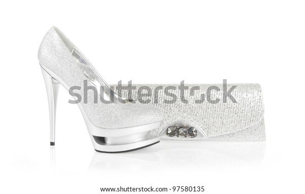 silver shoes and clutch bag