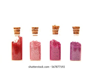 Glitter (small balls) in small glass bottles with corks - Powered by Shutterstock