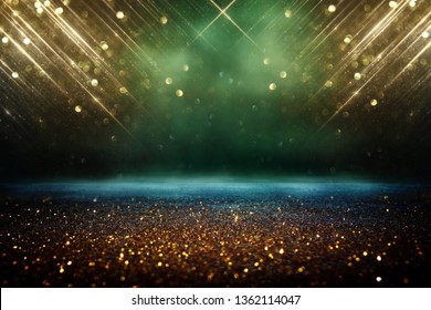 Glitter Vintage Lights Background. Black, Green And Gold. De-focused.