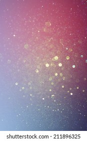 glitter vintage lights background. blue and purple. defocused 