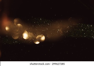 glitter vintage lights background. dark gold and black. defocused
 - Shutterstock ID 299627285