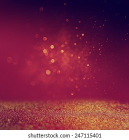 Glitter Vintage Lights Background. Gold, Red And Purple. Defocused 